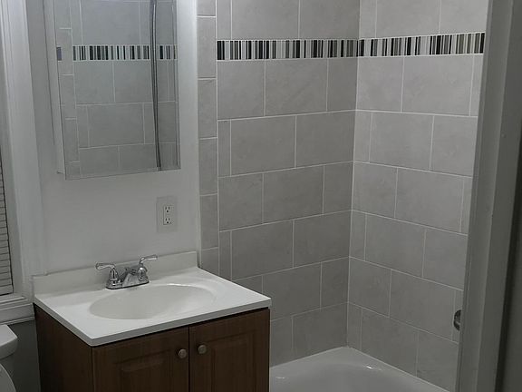 Bathroom - new tub and tiled walls
