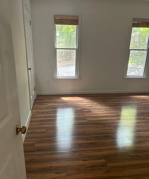 upstairs bedroom with private bath - front of home