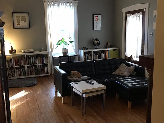 Living Room through door to Master Bedroom, front door to right, dining room to left