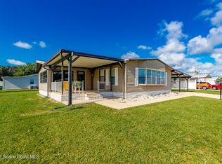 409 Macadamia Dr, Barefoot Bay, FL 32976