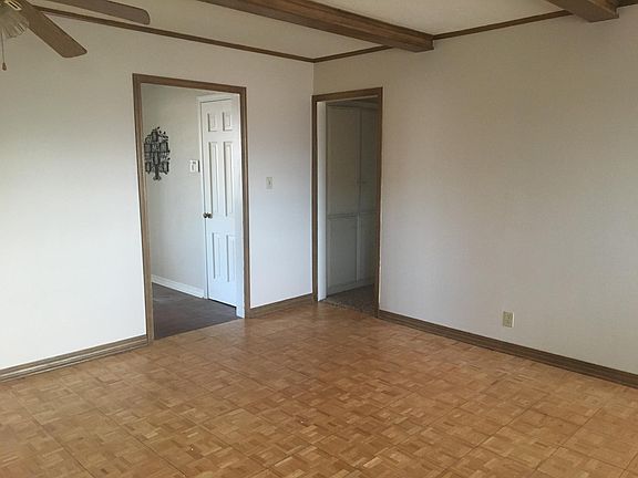 Den with Hardwood Floors