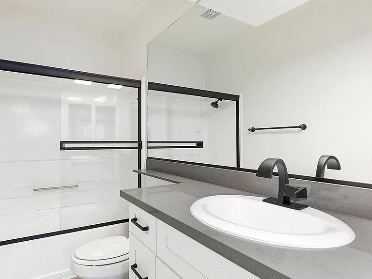 Modern styled bathroom with shower and tub.