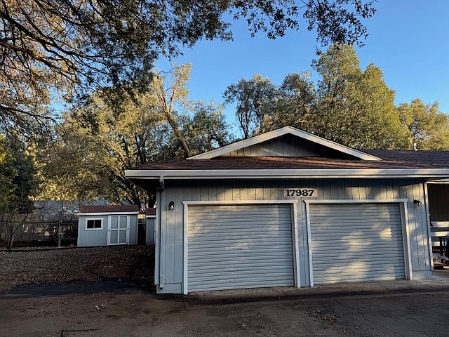 parking to left of garage and shed included