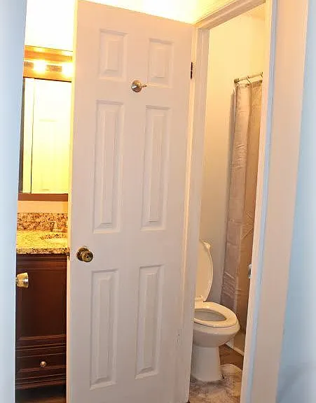 Water Closet with Shower/Soaking Tub, Vanity with Granite countertop in Master