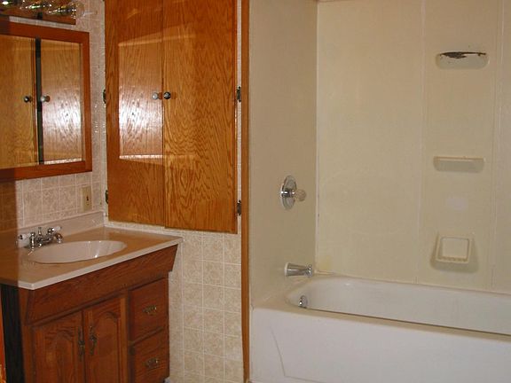 Bath with full tub and shower