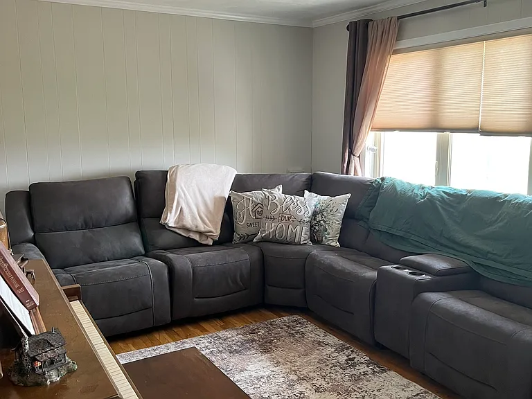 Living room with piano - we would love to have it played.