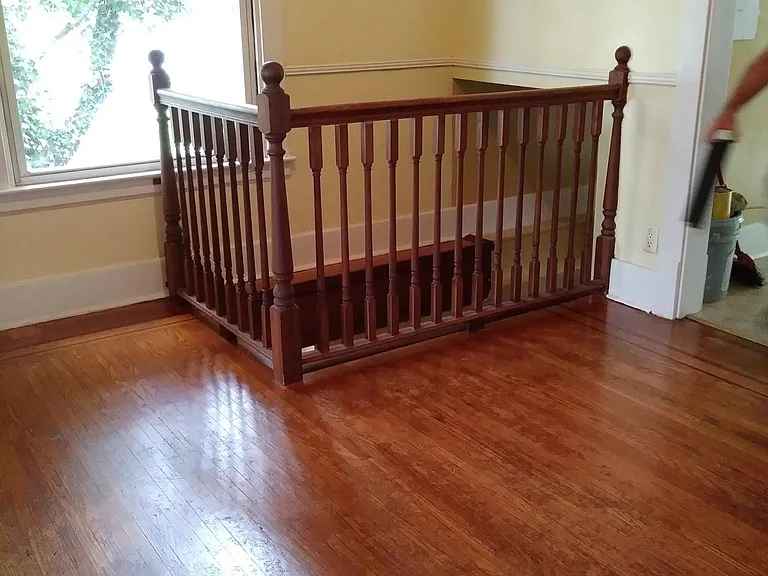 Dining Room with rail around basement steps
