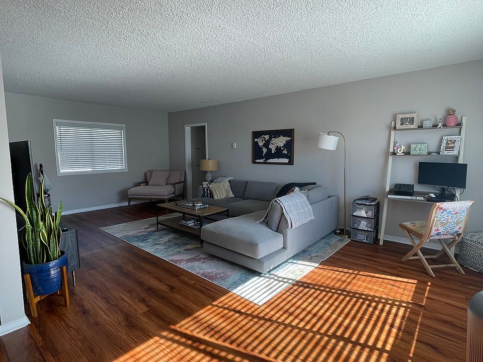 Living room, with room for full size couch and an office.