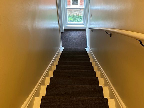 Stairs up to reach the Loft 2 BR