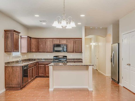 4th image of 14421 Fernando Zubia Ave