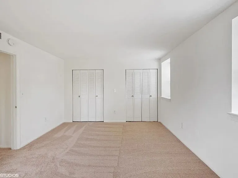 Bedroom with two closets