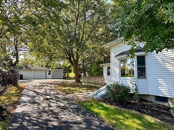 Driveway has lots of space to turn around. 2 car garage with extra storage room