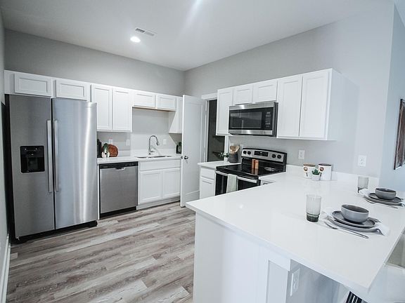 Kitchen with appliances seen included