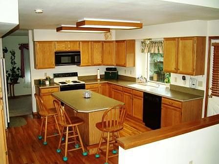 Updated Kitchen with New Granite look Counter Tops and Sink