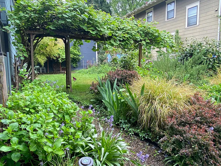 Private side yard with potential for one parking space