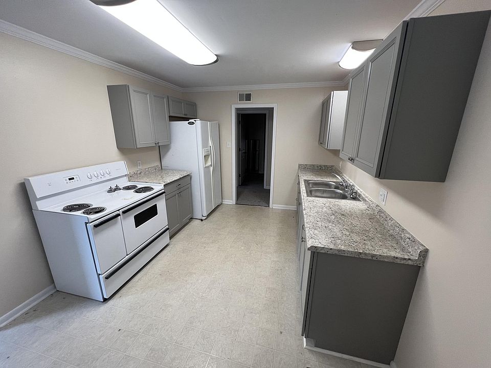 Kitchen view standing in dining area.