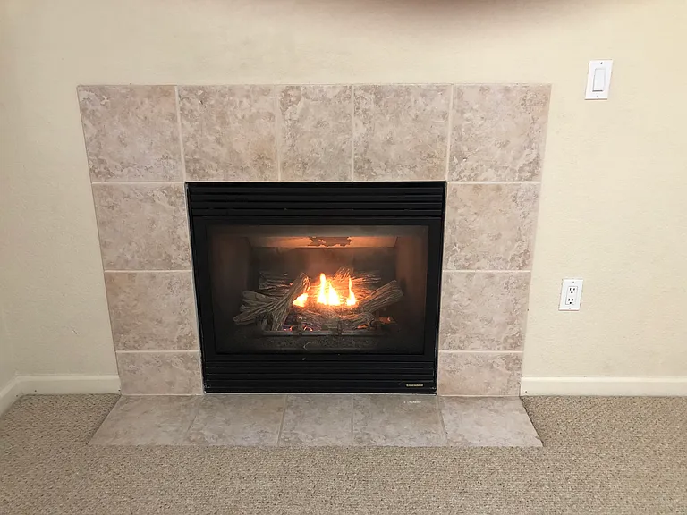 Light switch for easy on and off gas fireplace that puts out a lot of heat.