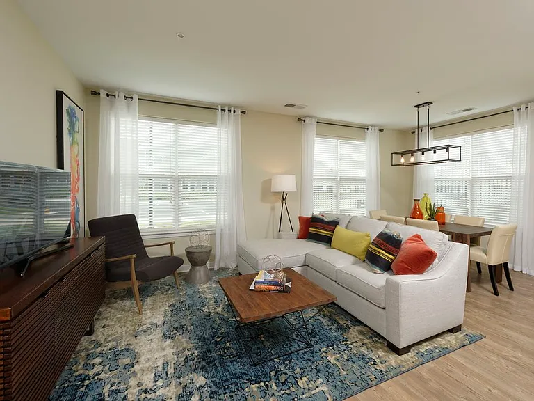 Two bedroom living and dining area with hard surface flooring