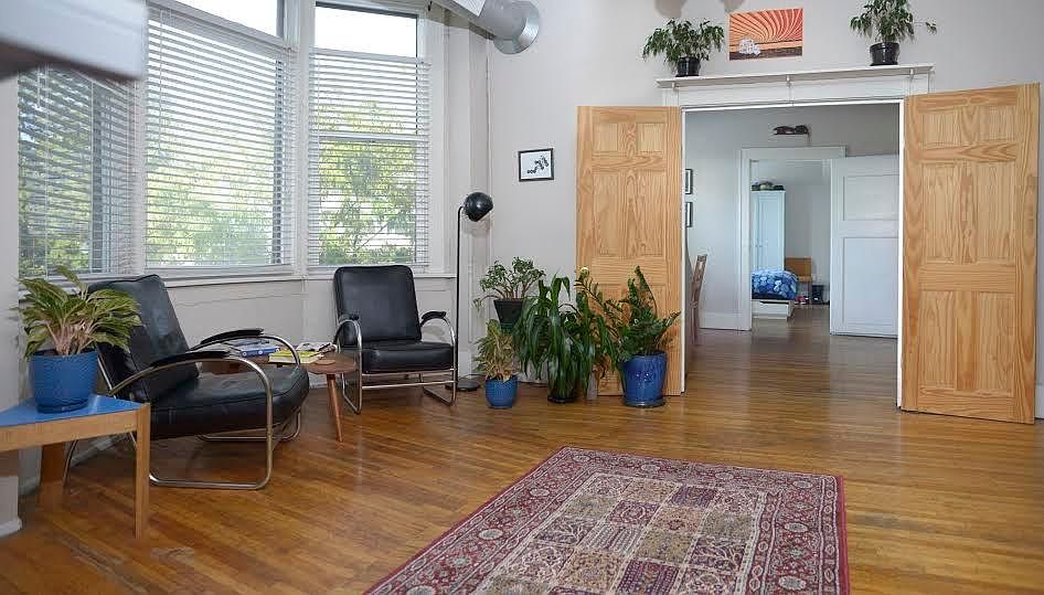 View of west bedroom, facing north east towards bay window.
