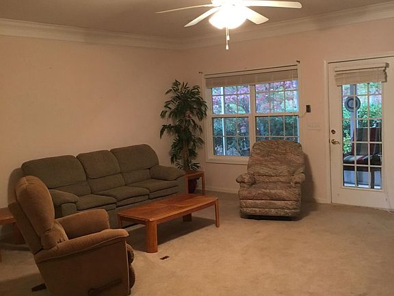 Living room with private screen porch 