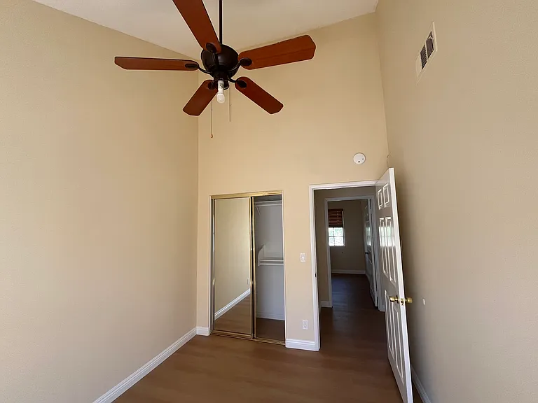 3rd bedroom with ceiling fan