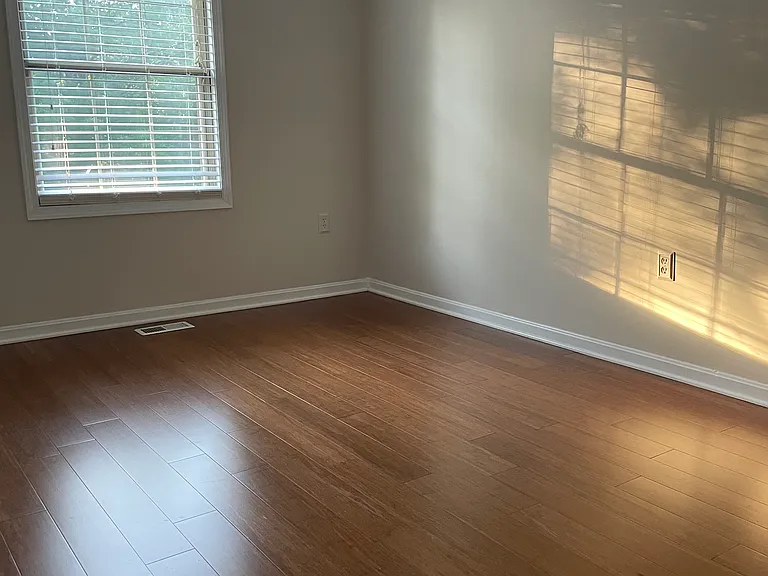 Bamboo engineered floor in this front bedroom (repainted light green) on the 3rd floor