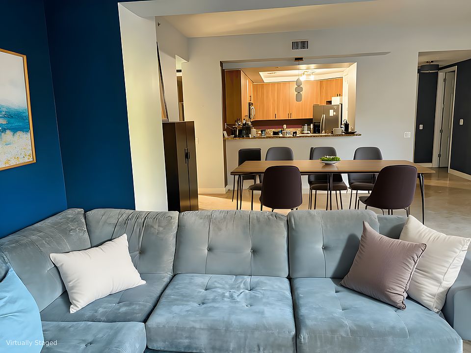 Virtually staged. You can have 2 living areas and a full dining area.
