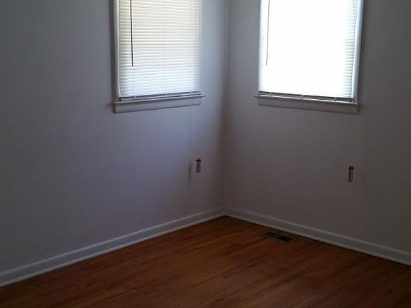 Bedrooms are both similar in size and appearance, easily hol