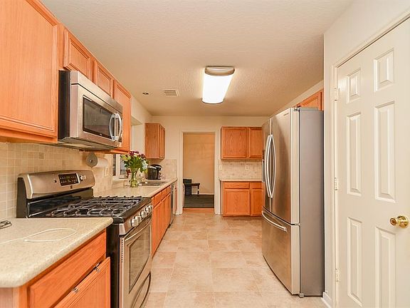 Recent microwave and stove.