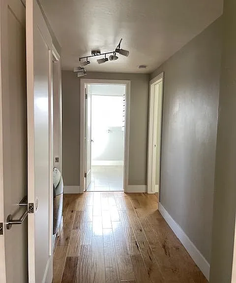 Hallway to w/d and bedrooms and all bath