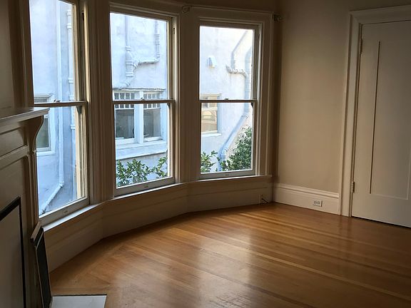 Large room with adjacent walk-in closet, used as a bedroom,