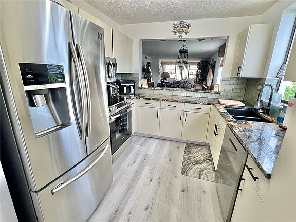 4th image of 10842 W Clairmont Circle #310