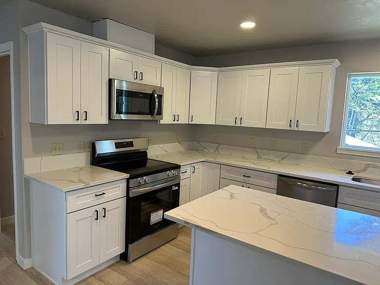 Brand new efficient appliances in kitchen