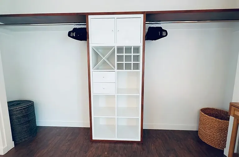 Large closet with ample storage and hanging space.
