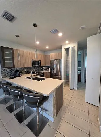 10222 NW 64th Way #302