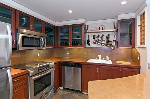 Slate flooring, premium stainless steel appliances, built-in
