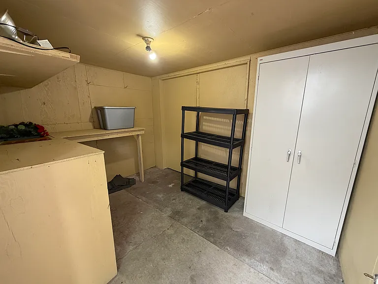 Large detached private storage room.