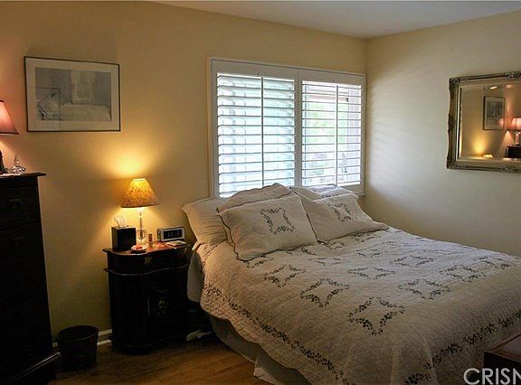 Master Bedroom with upgraded plantation shutters.