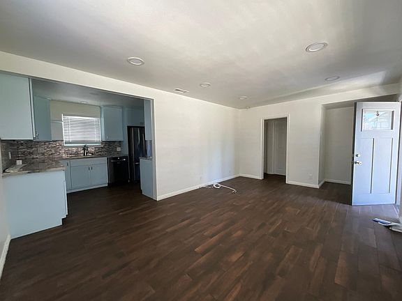 Living room flows to kitchem