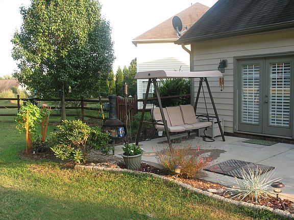 Back Patio, doors are to Master Bdrm.