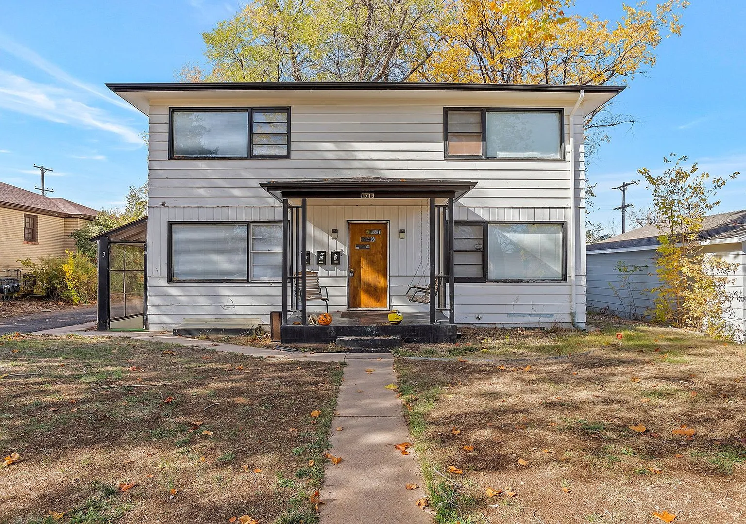 Charming vintage style two-bedroom nestled in Triplex home in Greeley, close to UNC! — Photo 1