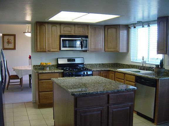 new kitchen cabinets w/ granit countertops.