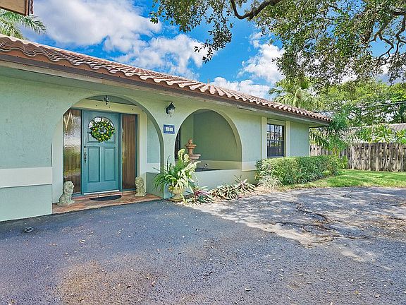 Quaint water fountain entry