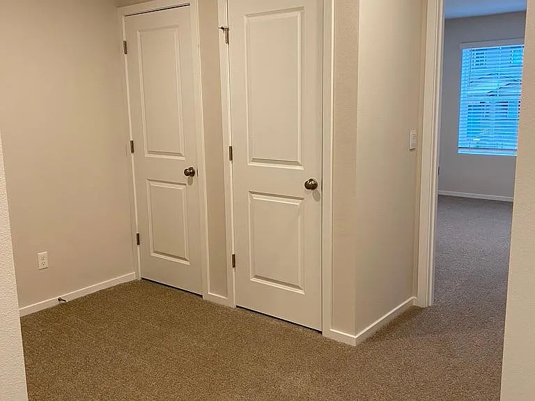Upstairs. Tech Niche, linen closet, laundry room, with door leading to Master.