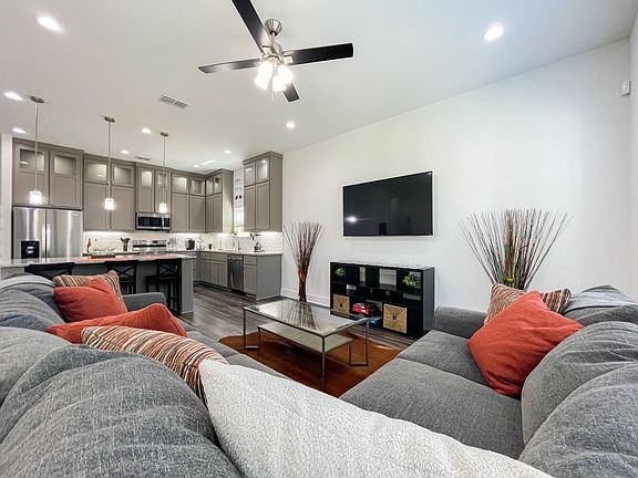 Open floor plan, kitchen to living