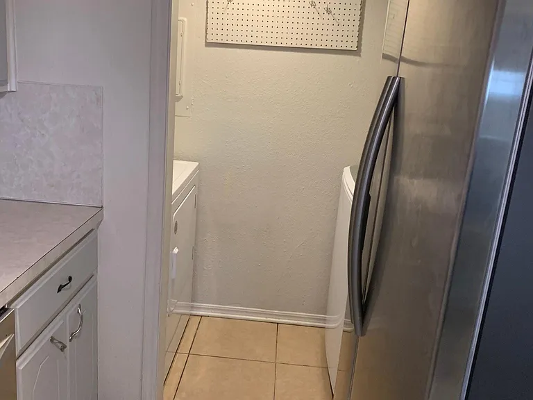 Laundry area next to the kitchen