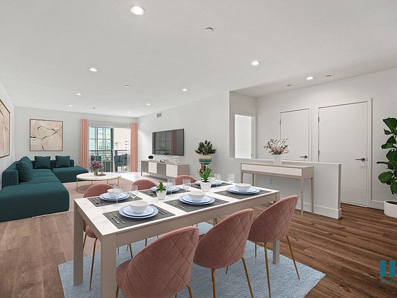 Open-Concept Dining and Living Room with Patio