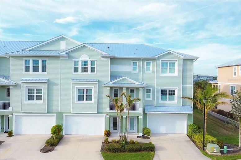 3 Story Townhouse with 4 Car Garage and Private Elevator