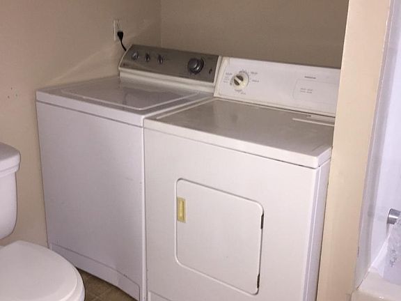 bathroom includes washer/dryer