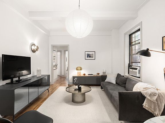 3rd image of 141 E 3rd St APT 1C